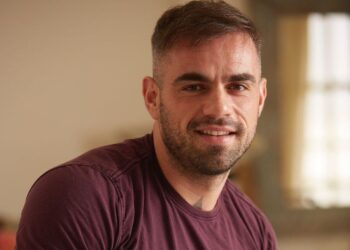 Florian Hurel, the renowned French hair and makeup artist, showcasing his artistic flair in a stunning hair design