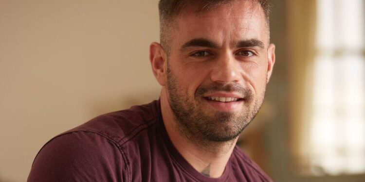 Florian Hurel, the renowned French hair and makeup artist, showcasing his artistic flair in a stunning hair design